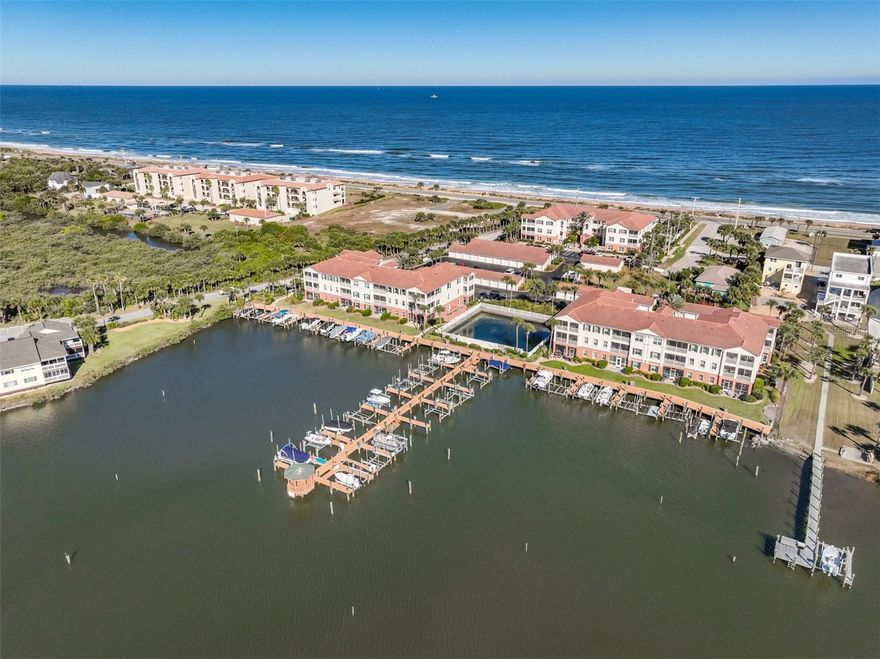 LOCATION, LOCATION, LOCATION. THIS CONDO IS IN THE PERFECT SETTING BETWEEN THE OCEAN AND THE INTRACOASTAL WATERWAY. JUST A FEW STEPS EAST OR WEST AND YOU CAN BE ON THE BEACH OR WATCHING THE BOATS ON THE ICW. THIS UPDATED CONDO IS PERFECT FOR A BOATER, SECOND HOME, OR THE EMPTY NESTER. NOT OFTEN YOU FIND A CONDO WITH A GARAGE AND LOCATED ON THE FIRST FLOOR FOR TOTAL CONVENIENCE OF NO STEPS OR ELEVATORS AND HAS DUAL ENTRANCES. USE THE SCREENED IN PORCH ENTRANCE WHEN COMING FROM THE BEACH OR POOL OR USE THE FRONT DOOR FOR UNLOADING THE CAR.THOSE ARE LITTLE THINGS THAT MAKE CONDO LIVING EASY, BREEZY (NO PUN INTENDED). CATCHING THE OCEAN BREEZES FROM THE POOL OR THE RIVER BREEZES FROM THE DOCK-ALL ABOUT THE LAID-BACK LIFESTYLE. WALK TO OUR FAVORITE COFFE JOINT FOR BREAKFAST OR A SPECIAL COFFEE OR TAKE A SHORT FIVE-MINUTE DRIVE IN EITHER DIRECTION FOR MORE RESTAURANTS, GROCERY STORES OR WHATEVER YOU NEED.  EVERYTHING IS SO CLOSE BUT YOU FEEL SO FAR AWAY IN THIS QUIET ENCLAVE OF CONDOS. Flagler Beach and Palm Coast are the best kept secrets in Florida. Miles of beautiful beaches, over 125 miles of bike paths, beautiful parks along Intracoastal Waterway, a thriving art & theater community, home of famous artists, golf courses for every day, fishing, boating, wind sailing, surfing, canoeing are just a few of the things to do. Orlando and Disney World are close for a day outing and Jacksonville with all the shopping one could desire & the famous Mayo Clinic is one hour. NASCAR & ST. Augustine are within a thirty-minute drive.