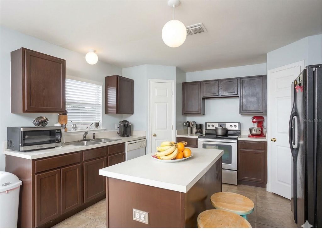 Photo of 6056 Kaley Drive, Winter Haven, FL 33880 (MLS # TB8485249)