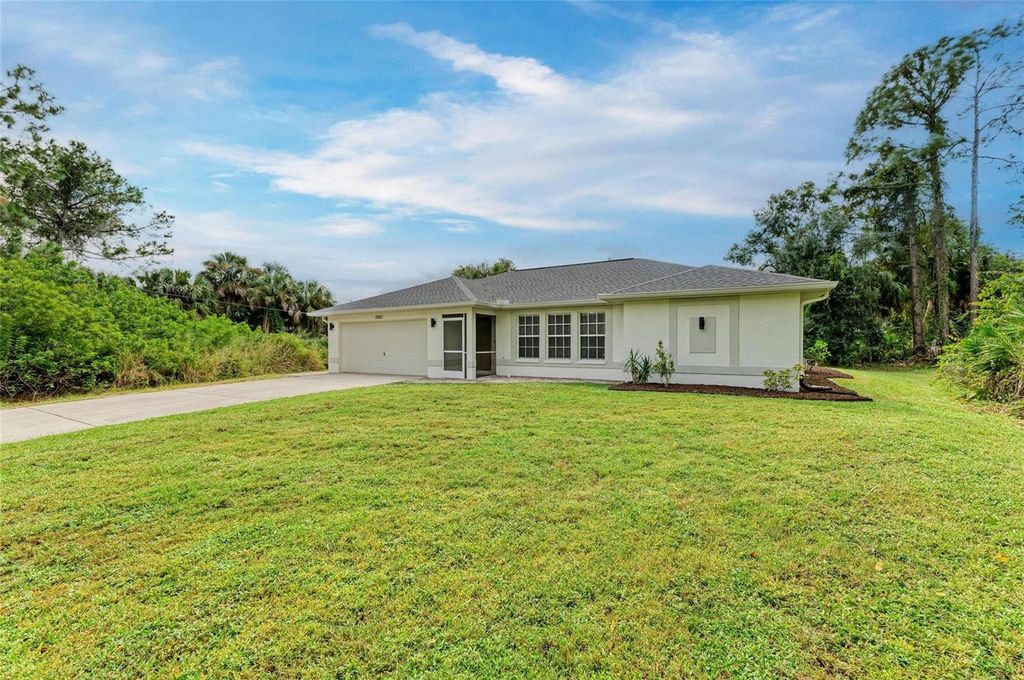 Photo of 3255 Tupelo Avenue, North Port, FL 34286 (MLS # A4668206)