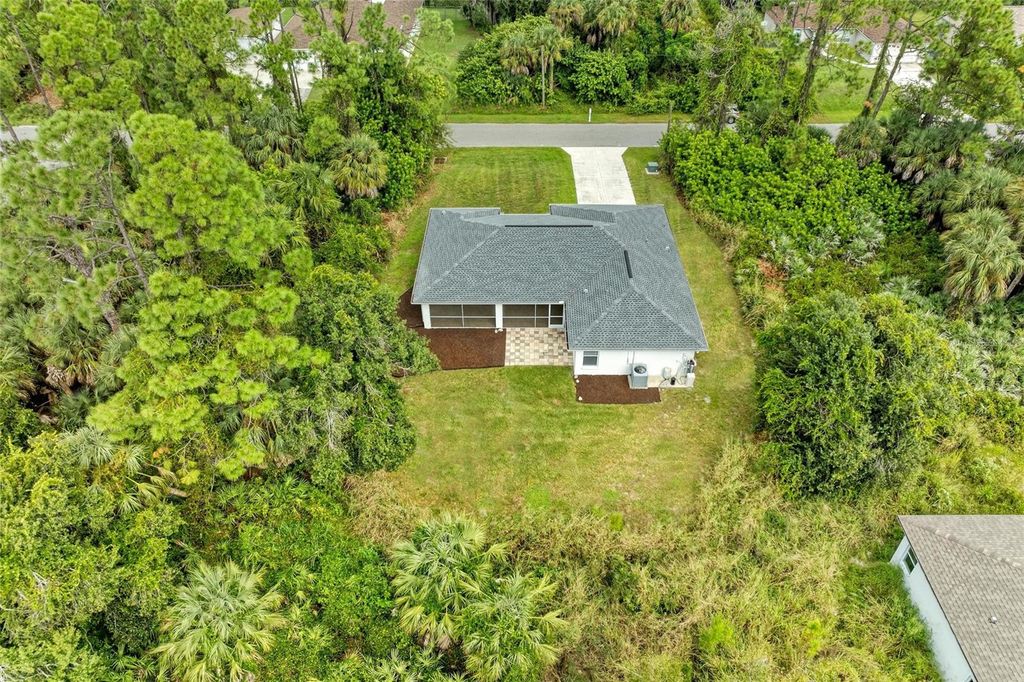 Photo of 3255 Tupelo Avenue, North Port, FL 34286 (MLS # A4668206)