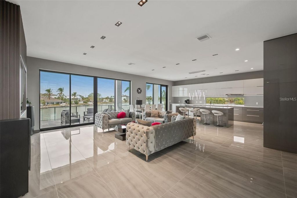 Photo of 36 Dolphin Drive, Treasure Island, FL 33706 (MLS # C7517469)