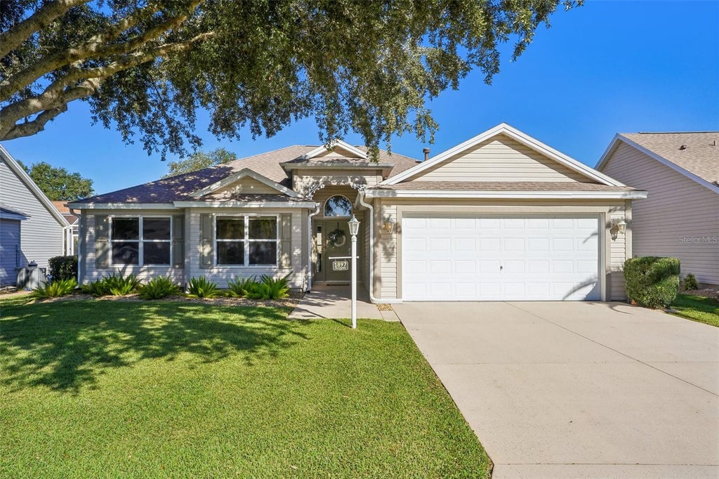 Photo of 1897 Caryle Lane, The Villages, FL 32162 (MLS # G5119089)
