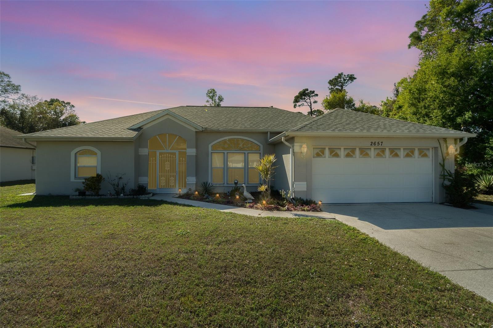 # North Port Pool Home with City Water – Priced to Sell Fast!
Welcome to your slice of Florida paradise at **2657 Tusket Ave**! This charming **3-bedroom, 2-bathroom pool home** not only boasts an **oasis-like private pool**, but also comes with the convenience of **city water** – a rare find in this area. Step inside to over **1,800 sq. ft.** of open living space, including a formal living room, a dining area, and a cozy family room. The **2-car garage** provides ample storage and parking, completing this home’s fantastic first impression.
## Spacious & Open Interior
Inside, the **open floor plan** perfectly blends style and function for an inviting atmosphere. A **centrally located kitchen** truly serves as the heart of the home, allowing you to stay connected with family and guests whether you’re cooking up a feast or preparing a quick snack. With **no carpet** (only durable laminate and ceramic tile flooring throughout), this home is ideal for an active lifestyle – easy to maintain and great for families or pets. It’s move-in ready and also a perfect canvas to add your personal touches, giving you the freedom to make it your own without extra hassle.
## Outdoor Oasis
Slide open the glass doors from either the living room or the family room and step into your private outdoor oasis. A covered **lanai** offers a shaded retreat and seamlessly transitions to the **screened-in pool area**, perfect for lounging on sunny Florida days or hosting weekend pool parties. The **sparkling in-ground pool** invites you to cool off and relax, surrounded by a spacious deck within the screened enclosure (goodbye bugs!). Beyond the pool, the **generous 80×125 ft. lot** provides plenty of backyard space. There’s even a **separate covered patio** in the rear – ideal for grilling, outdoor dining, or unwinding with a good book in the evenings. The yard offers privacy and room to play, all with **no HOA restrictions**, so you can truly enjoy your property your way.
## Prime Location & Convenience
Location is everything, and this home delivers. Nestled in a family-friendly North Port neighborhood, you’re minutes away from local **parks, playgrounds, and recreation areas** – perfect for outdoor fun and an active lifestyle. Love shopping and dining? You’ll find **shopping centers, grocery stores, and restaurants** just a short drive from your doorstep (the popular Cocoplum Village Shops and more!). Plus, living here means an easy commute or quick trips to nearby attractions: **convenient access to I-75 and US-41** puts you on the fast track to beaches, golf courses, and the greater Sarasota/Port Charlotte area. Whether it’s a day at a Gulf Coast beach or just running errands, you’ll spend less time driving and more time enjoying North Port and the surrounding region.
## Priced to Sell – Don’t Miss Out!
This **great-value pool home** is *priced for a quick sale*, making it a fantastic opportunity for savvy buyers. With its city water convenience, fabulous pool, and prime location, it’s your chance to own a slice of North Port paradise at an unbeatable price. **Don’t wait** – homes with these features and at this price point don’t stay on the market for long. Contact us today to schedule your private showing and see for yourself. Your future home awaits, but it won’t wait forever – seize this opportunity before it’s gone!