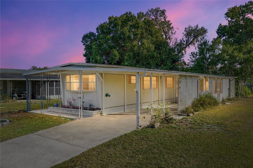 Welcome to Shady Oaks Mobile Home Community, an active 55+ age restricted community in Zephyrhills, FL. Park amenities include shuffleboard, community pool, and a vibrant clubhouse with a full schedule of activities. This 2bed/1bath single wide mobile home, is a great affordable option for those seeking to own a second home or to permanently retire in Florida. The open floor plan seamlessly connects the living, dining, and kitchen areas, creating a welcoming environment for relaxing or entertaining! A second bedroom and bathroom provide comfortable accommodations for guests or additional space for hobbies or an office. Step outside to enjoy the Florida sunshine on your private patio, perfect for morning coffee or an evening glass of wine. The low-maintenance yard ensures you have more time to take advantage of the community’s amenities. Shady Oaks community is conveniently located 4 miles from local hospital, less than 1 mile from Zephyrhills city limits, 35 miles from Tampa International Airport, 12.5 miles to local shopping mall, and 4 miles to local grocery stores or restaurants.