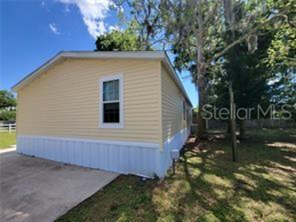 Photo of 10386 SE 52nd Court #1, Belleview, FL 34420 (MLS # OM713667)