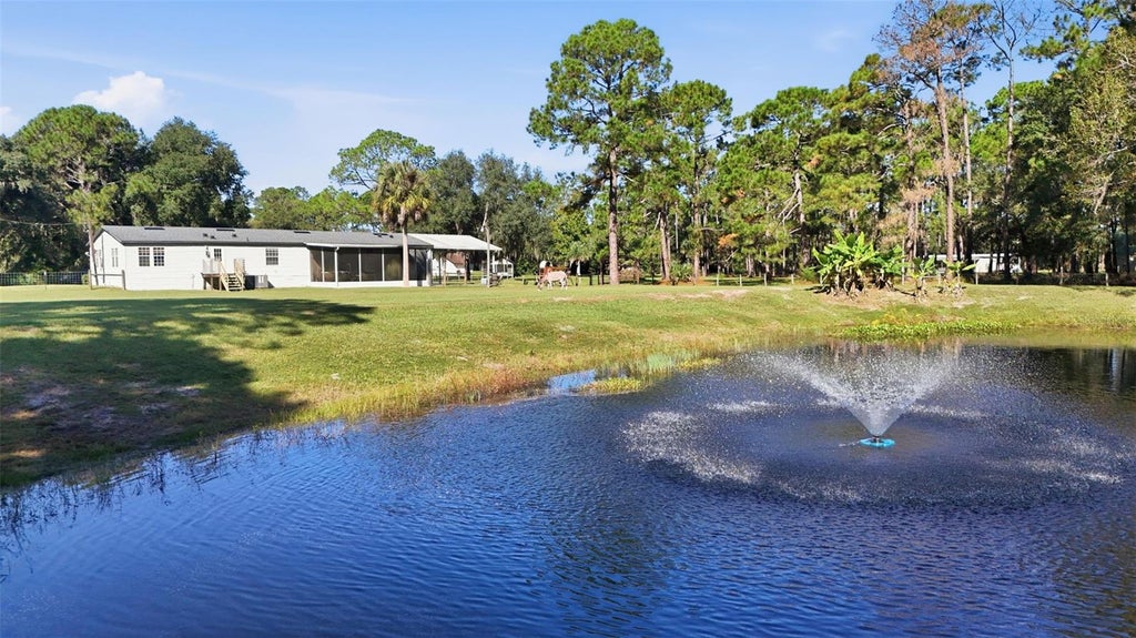 Photo of 40928 Bridle Path Lane, Leesburg, FL 34788 (MLS # G5119234)