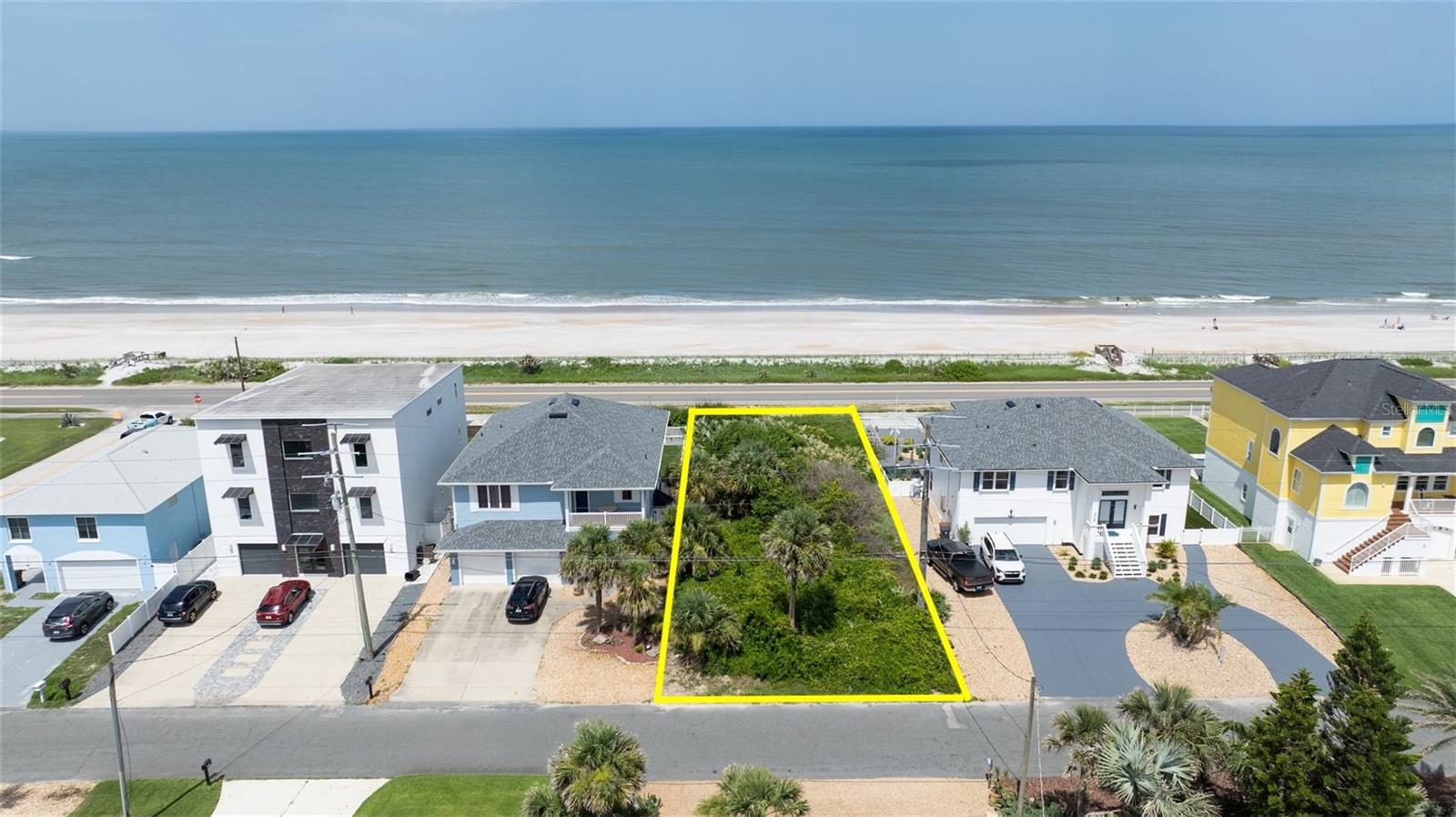 Discover a rare opportunity to own a prime coastal beachside vacant lot just a couple miles south of the iconic Flagler Beach Pier and directly across the street from the atlantic ocean with unobstructed panoramic ocean views. This 50' X 151' buildable parcel places you steps away from vibrant restaurants, shopping, parks and nightlife, with easy access to sun-soaked beaches perfect for surfing, sunbathing, walking, and biking. Enjoy nearby boat ramps on the river for endless water adventures. As one of the last remaining lots available at this price point, seize your chance to invest in Flagler Beach’s exciting growth before this coveted coastal lifestyle becomes unattainable. ALL INFORMATION IS ASSUMED ACCURATE BUT NOT GUARANTEED. ALL MEASUREMENTS ARE APPROXIMATE. BUYERS AND THEIR AGENTS SHALL VERIFY ANY INFORMATION DEEMED IMPORTANT TO THEM.