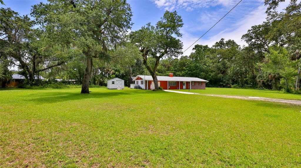 Photo of 585 Corbin Park Road, New Smyrna Beach, FL 32168 (MLS # NS1085079)