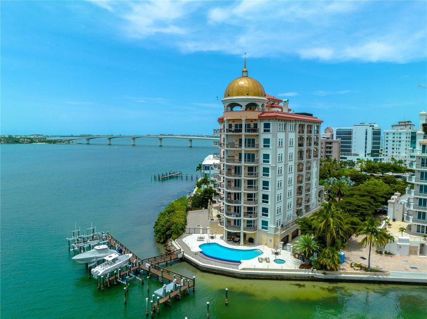 Rarely Available - Enjoy exclusive waterfront living in the iconic Grande Riviera Condominium. This newly renovated condo features a brand new kitchen with a La CornueFe Range and Range Hood, double drawer dishwasher, built-in fridge, marble backsplash, and custom wood cabinetry. All three bathrooms have also undergone a transformation and feature custom vanities, floor to ceiling tile, and high-end finishes. With only 13 residences, Grande Riviera’s trademark copper dome is a beacon to all those searching for the epitome of Sarasota luxury living. Created with a European flair that maximizes water views, you’ll find this 2 bed/2.5 bath with den a spacious retreat on the tip of Golden Gate Point. With over 2,650 sf, private 2-car garage and multiple living zones, it lives more like a single residence than a condo.  The Grand Riviera is a gated, secured building with concierge service, building manager, storage and dedicated 2-car garages for each residence. The Ringling Bridge, Ritz Carlton, downtown shops and restaurants, Marina Jack and Sarasota’s bayfront are all easily walkable - with St. Armand’s, Lido Key and Sarasota Memorial Hospital a short 5 minutes away. A truly unique and incredibly desirable building and location. Rarely available - timing is everything!