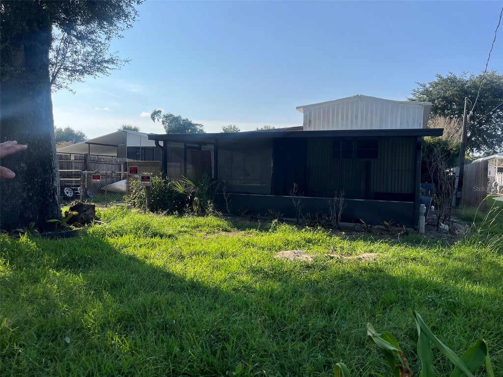 Photo of 214 Indian Creek Road, Oak Hill, FL 32759 (MLS # NS1088894)