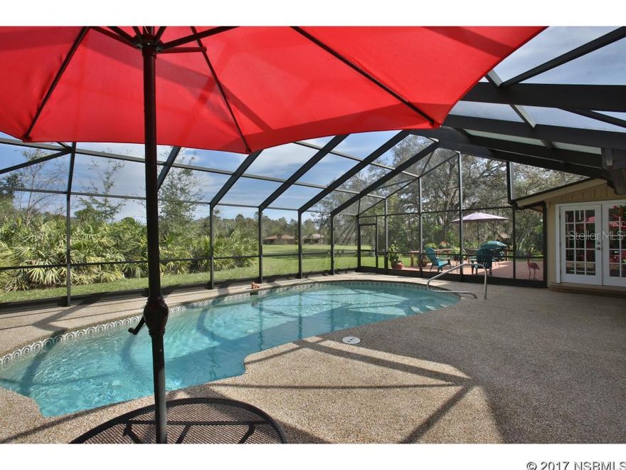 Imagine yourself living the good life in paradise in this three bedroom, three and a half bath renovated pool home overlooking the beautiful 27 golf course. This exquisite home has a gas-log stone fireplace in the spacious living room and a wet bar for entertaining. The fully screened pool is just off the large deck overlooking the golf course which is perfect for outdoor entertaining. There is a great family room/dining room off the living room which leads outside to the deck. The newly remodeled kitchen is a cooks paradise with it's large granite top island and granite countertops with eating area. There are plenty of cabinets to store all your kitchen needs. The Master bedroom offers a large walk-in closet and private bath. The second bedroom is large and has a private full bathh. Your second floor guest suite has a walk-in closet and bath. This room could also be an in-law suite. There is a two-car garage with separate golf cart door. There are many amenities available in Sugar Mill including a beautiful clubhouse with two dining areas and a snack bar. There is a pool, activity center for your work-outs and tennis courts. These are by seperate membership. What else could one want to enjoy a fantastic lifestyle. You will definately want to see this home. ;Water: City