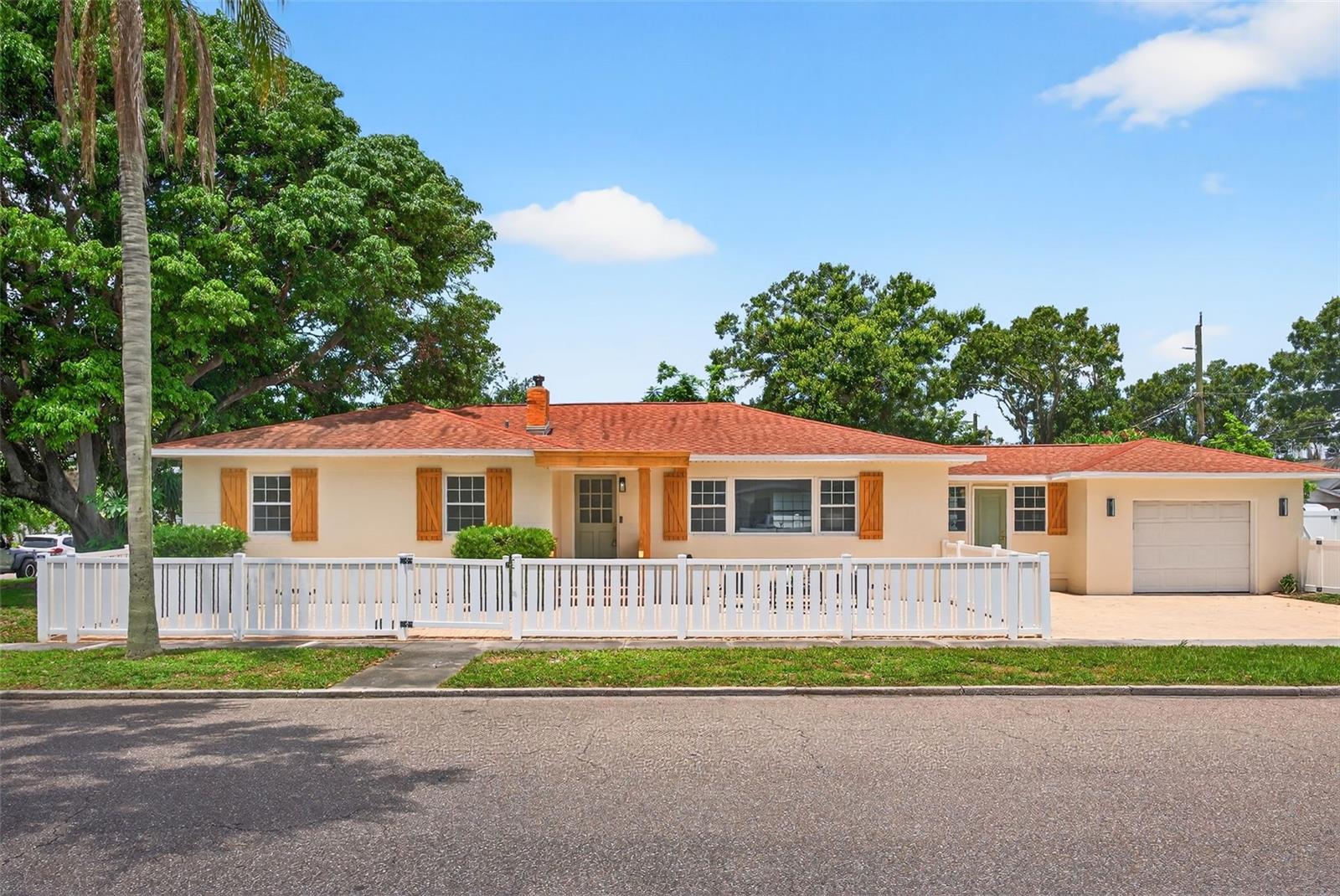 Mid Century Charm Meets Historic Kenwood! Prepare to be wowed by this fully renovated and reimagined 3-bedroom 2 bathroom solid block home with over 1700 sqft of living space. This property has been curated to offer the best of city living and will "flip the switch" on living in Historic Kenwood. Designed to minimize maintenance, the exterior features a large paver patio for entertaining (keeping the tradition of a porch party with neighbors) and a driveway with additional green space on the side for easy access for your furry friends. Stepping inside the house, you will be impressed by the open floor plan's design, featuring Scandinavian-inspired flooring and a smartly designed kitchen that anchors the heart of the home. The kitchen is an entertainer's dream, offering stunning details at every turn, with custom cabinetry, a custom pantry and storage options, as well as a large central island for seating and additional storage. The oversized living room opens seamlessly to the kitchen and dining area and makes enjoying this space that much more with a myriad of seating options. The intimate dining room offers a sun-filled room as well as dramatic lighting options for evening entertaining. Three full bedrooms on the opposite side of the house offer 2 bedrooms sharing a hallway bathroom with a tub shower combo and rich green glazed subway tiles. The primary bedroom offers an en suite bathroom with an impressionist floral glazed tile detail on the walls in the shower. A conveniently attached 1-car garage offers laundry as well as easy access to the rear and side yard. Enjoy all the fun that living in Historic Kenwood has to offer, with close proximity to Central Avenue to enjoy coffeehouses, neighborhood dining, as well as lively entertainment options all along the way!
Historic Kenwood offers a wonderful neighborhood lifestyle with the pleasure of walking and biking in the neighborhood to parks and local fun spots! This dreamy property "flipped the switch" on the best of City living at its finest! Located in a non-flood zone.