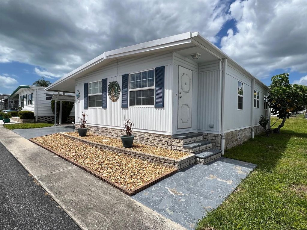 Photo of 574 Queen Palm Street, Largo, FL 33778 (MLS # TB8496855)