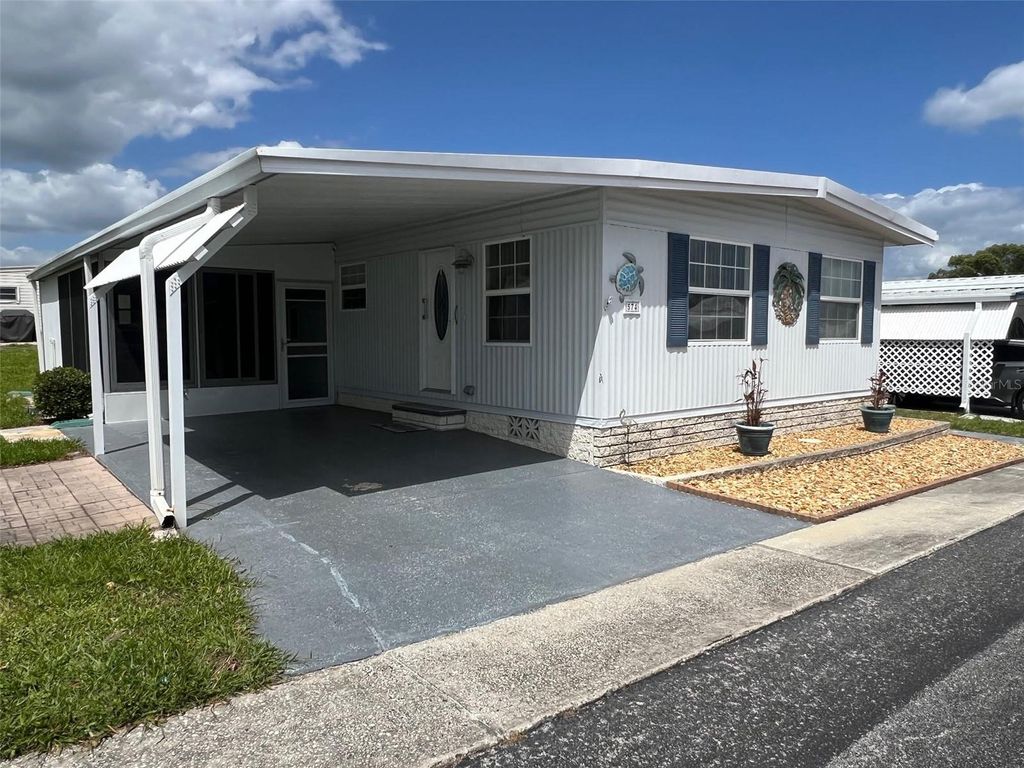 Photo of 574 Queen Palm Street, Largo, FL 33778 (MLS # TB8496855)