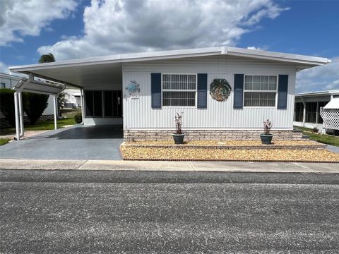 Photo of 574 Queen Palm Street, Largo, FL 33778 (MLS # TB8496855)
