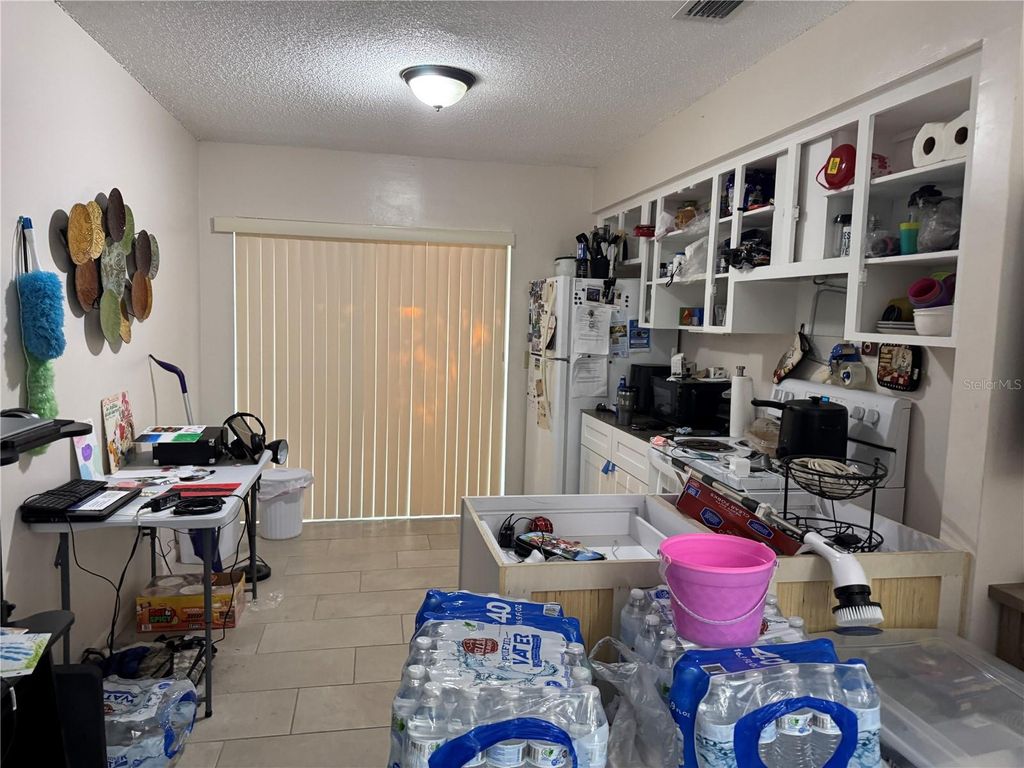 Photo of 201 E Buchanon Avenue, Orlando, FL 32809 (MLS # O6407420)