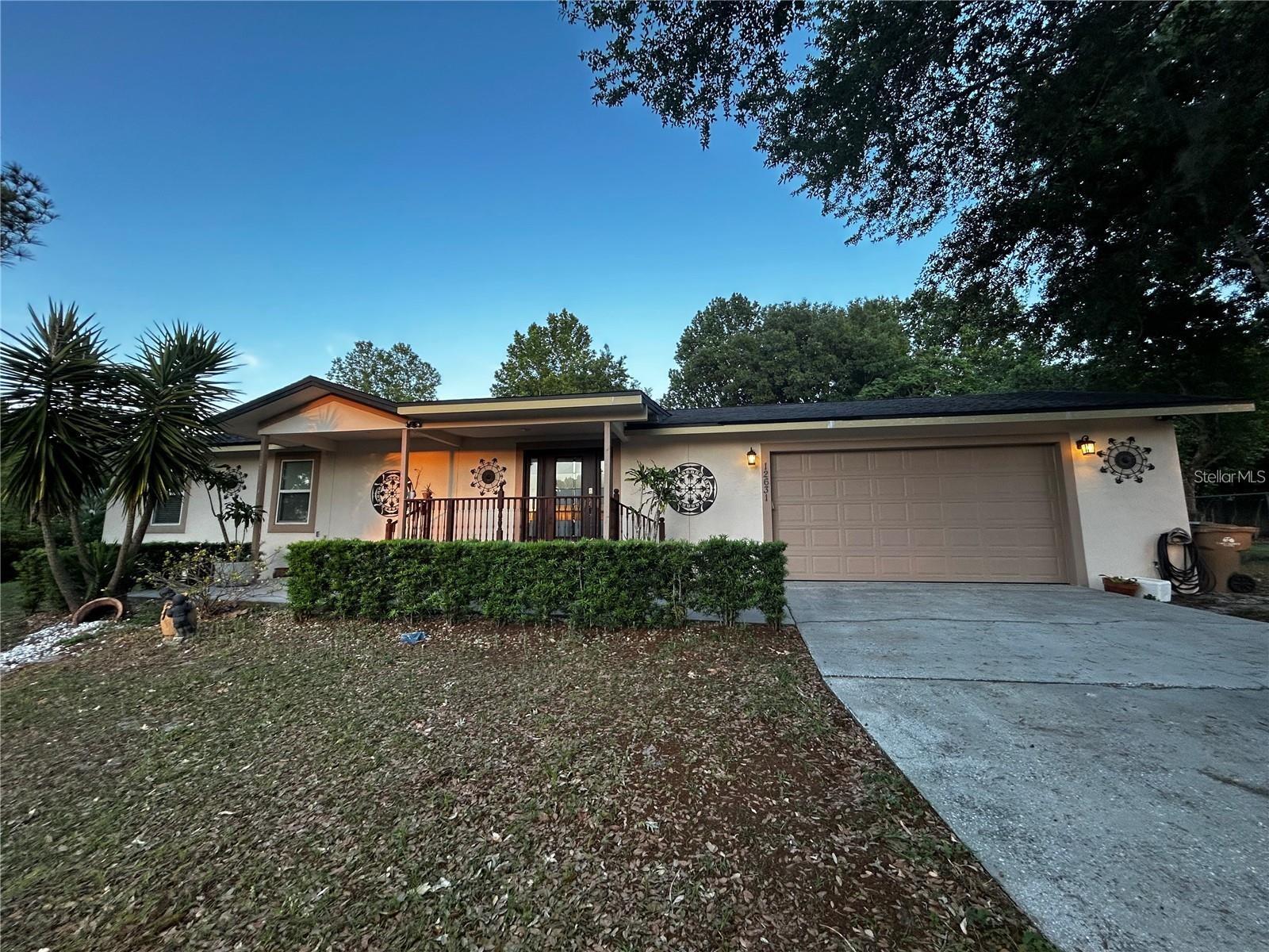 All tiled, open floor plan to maximize space and family gatherings. The home features 3 bedrooms, 2 baths, a family room and, the huge kitchen island in the center of it all. The backyard is fully fenced in, two cars garage and a front porch are just a few extras.