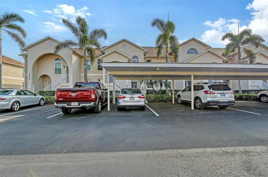 Best Value in Pinestone Palmer Ranch condo close to Siesta Key and Legacy bike/walking trail. Chateau model is largest floor plan with 1604 square feet, soaring two story ceilings, spacious master bedroom room suite. This open airy condo lives more like a house, generous closet space and storage. New AC May 2024, updated appliances. Ceramic tile laid on the diagonal throughout living main area. Master bedroom has Bamboo floors, granite in Kitchen and baths. This unit is very clean, move in condition. Also has Two (2) covered Carports. Gated community with junior olympic sized heated pool and hot tub/spa. Lighted tennis and pickle ball courts, basketball court, bicycle stands, BBQ/picnic area. Clubhouse includes fitness center, billard and card rooms, library and private 32 seat movie theatre. Pinestone is 1/2 mile to Sarasota Square Mall, Costco, YMCA, theatres and dining. Furnishings available