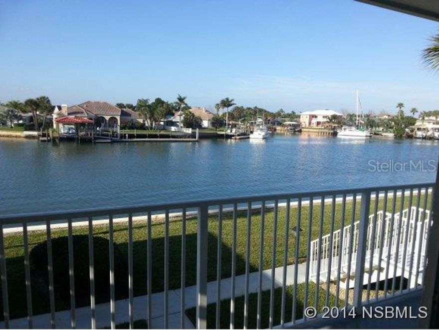 Spectacular waterfront unit on part of the intracoastal waterway. Enjoy awesome sunsets from your 2nd floor balcony. Fish off the seawall 30 ft. from your back door. 8 ft. sliding doors in the living and master bedroom overlook the water. End unit affords extra privacy and additional natural light from the side windows in the living and dining area. Newly carpeted and painted. Complex includes boating slips (as become available) to rent, fishing pier, pool and clubhouse. Nice quiet community. Covered parking. Walk or bike ride to restaurants and shopping on Flagler Avenue and then to the Beach. Being sold "as is". ;LocationDescription: Condo ;Water: City