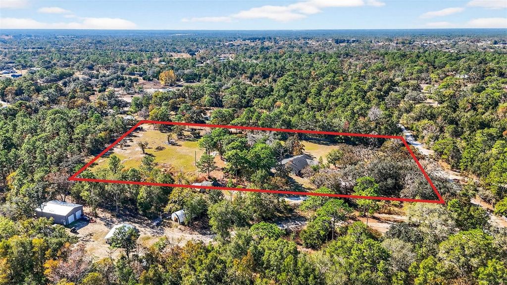 Photo of 14252 Trinity Road, Brooksville, FL 34614 (MLS # TB8452182)