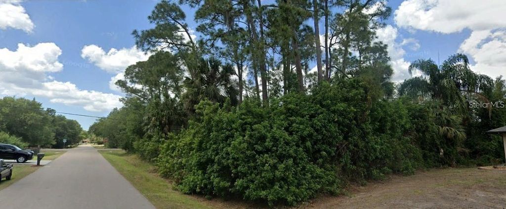 Photo of 22406 Blanchard Avenue, Port Charlotte, FL 33952 (MLS # O6333374)