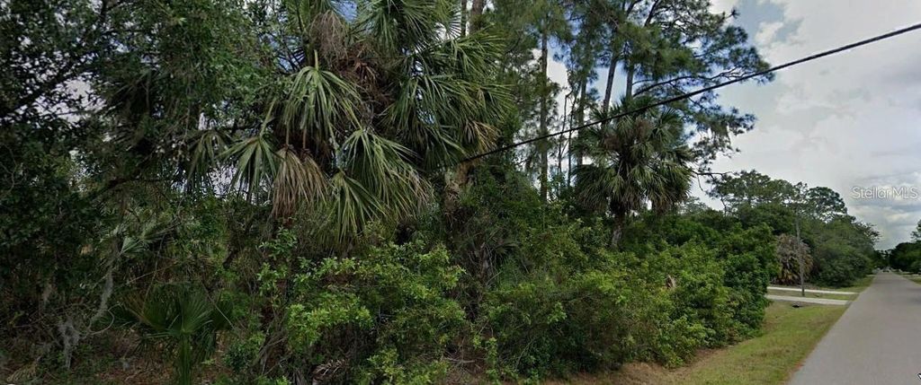 Photo of 22406 Blanchard Avenue, Port Charlotte, FL 33952 (MLS # O6333374)