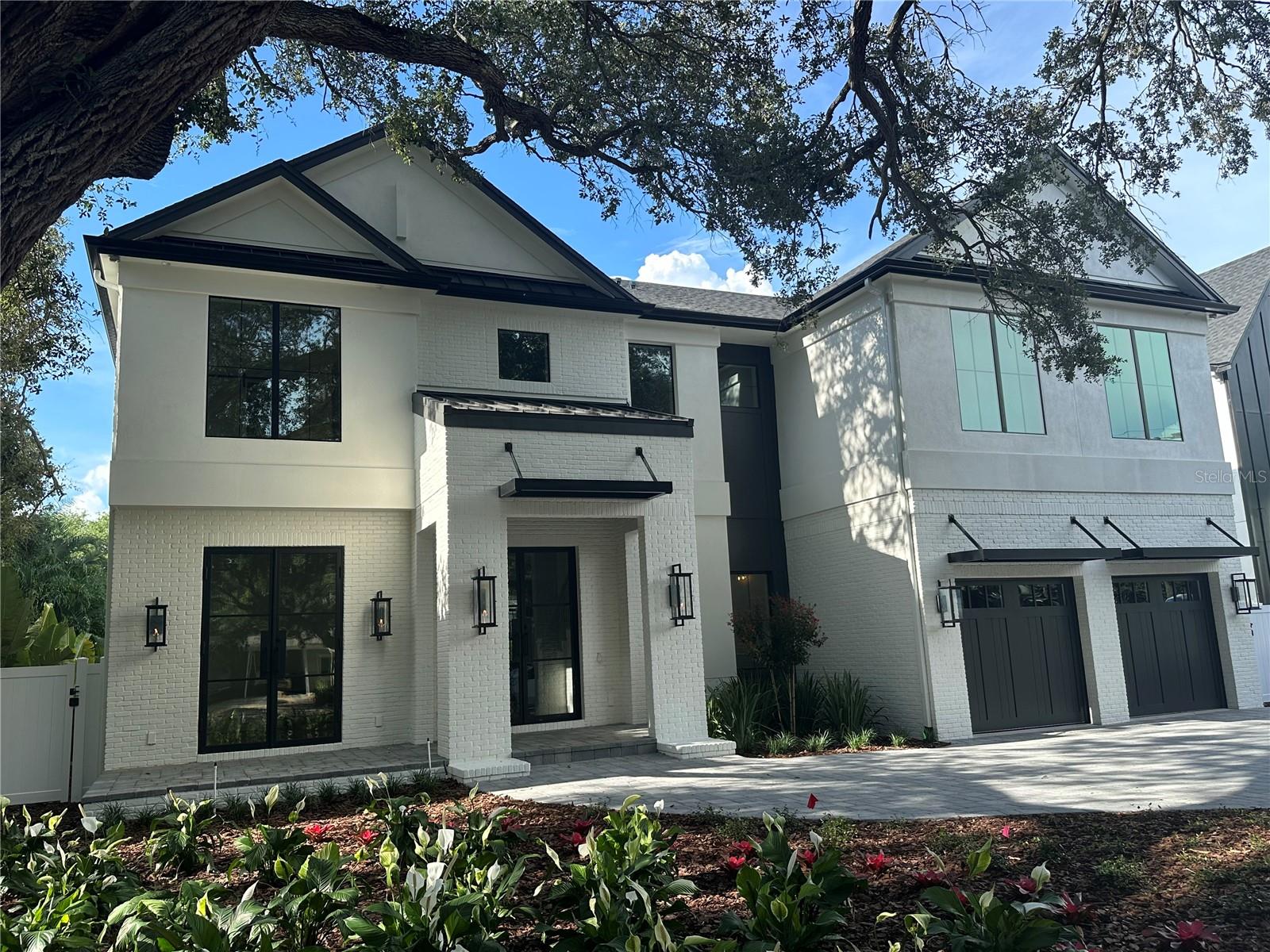 Pre-Construction. To be built. Welcome to the "Birchwood" model by Luxury Home Builder, Taralon Homes! This custom home will sit on a beautiful tree lined street in sought after Bayshore Beautiful. The home has 4,922 sf of living space with 5 ensuite bedrooms (one guest suite located on the first floor), 2 additional half baths, a 1st floor office, an upstairs game room, a 3 car garage, plus a beautiful heated pool with spa. There are custom luxury finishes throughout the home including a custom iron front door, stairwell with wood tread and iron balusters, 7 inch plank wood flooring, porcelain tile throughout the wet areas, crown molding, 8 foot interior doors and soaring 11.4 foot ceilings on the first floor with 10 feet on the 2nd floor, custom built closets, both upstairs and downstairs laundry facilities, upgraded spray foam in the attic +++ so much more! The kitchen features maple wood cabinetry, 42” upper cabinets with light rails and glass doors, your choice of granite or quartz with island to have waterfall edge countertop, tile backsplash, built in full size Thermador refrigerator and full size Thermador freezer, 48 inch Thermador gas range with griddle and a custom 52 inch range hood, and wine chiller. Situated off the kitchen and grand living room is the large, covered lanai with tongue and groove painted ceiling, built in outdoor kitchen with gas grill all overlooking the gorgeous pool and spa and finished off with silver travertine pavers. MAKE YOUR CUSTOM SELECTIONS NOW to add your own personal touch! Brochure with the floorplan and detail of the finishes is available.