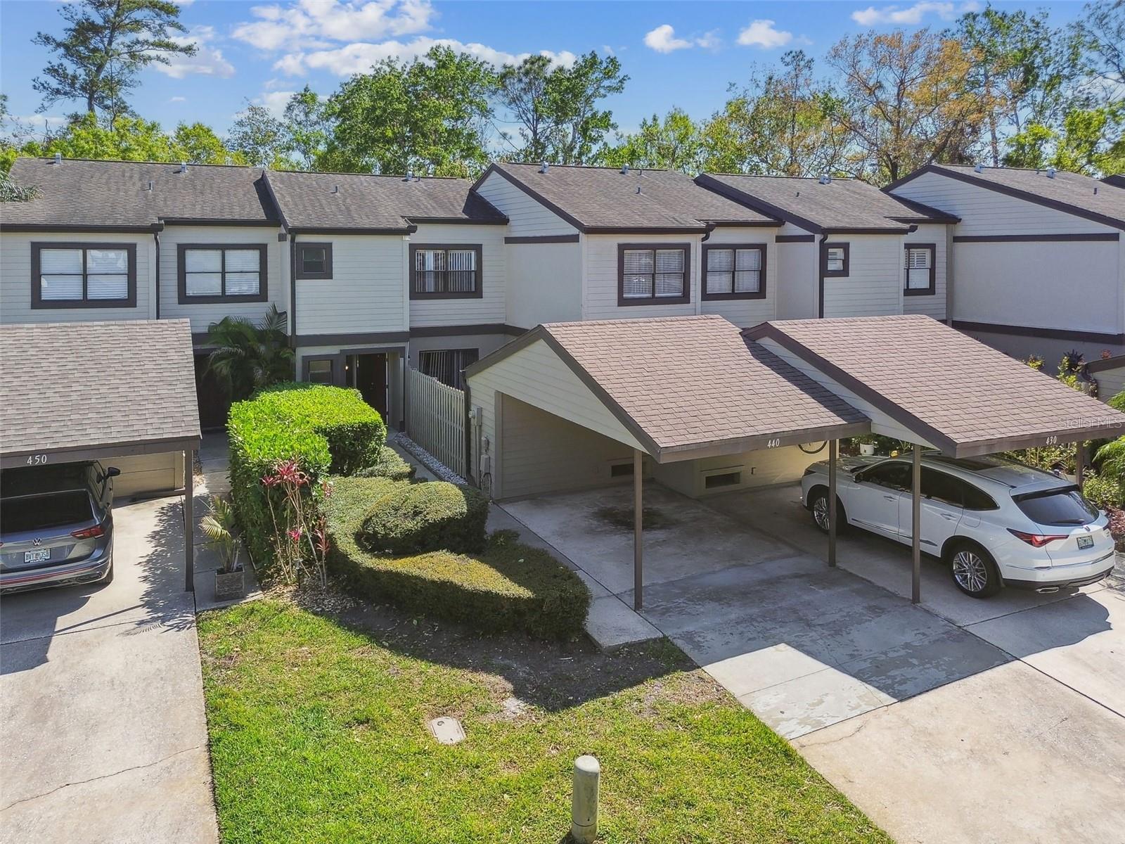 Come see this newly renovated 2-bedroom, 2.5-bath townhome is nestled in the gated community of East Lake Woodlands. With a spacious layout, this home is ready for you to move right in. As you step inside, you’re greeted by an open-concept living area and half bath perfect for entertaining. The kitchen features a breakfast bar, making it ideal for casual dining or morning coffee. Each bedroom boasts its own ensuite bathrooms (recently updated), providing comfort and privacy for family or guests. Outside, you have your own private courtyard recently renovated with brand new pavers off the kitchen, but you may prefer your private screened-in patio—perfect for enjoying the outdoors while being protected from the elements. This townhome also includes convenient features like upstairs laundry, a large storage room and carport for covered parking. Woods Landing includes its own community pool, basic cable, internet, common grounds maintenance, trash service, and is located within a gated community. East Lake Woodlands is home to the recently renovated Ardea Country Club. They have various membership options where you may find yourself frequenting the club pool, restaurant/bar, fitness center, racquet courts, member events, or playing one of the two 18-hole golf courses. Don’t miss out on this incredible opportunity to live in East Lake Woodlands!