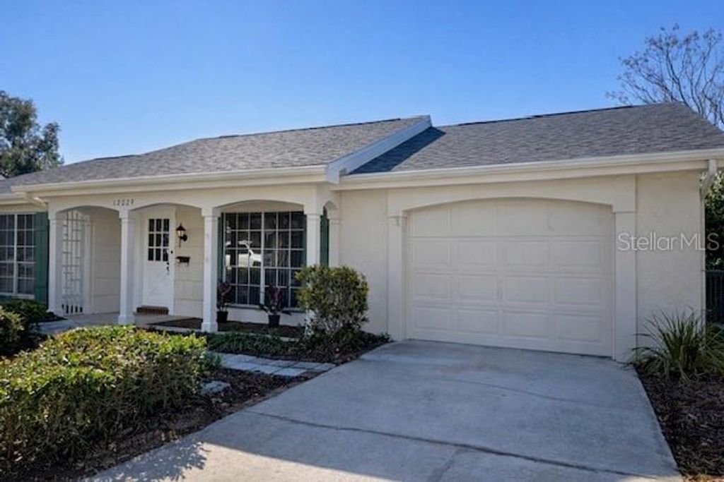 Photo of 12229 Bear Claw Loop, Hudson, FL 34667 (MLS # W7883061)