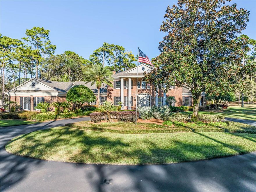 On a sprawling six-acre lot in the charming city of Deland, this home is an exquisite estate that combines luxurious living with a touch of tranquility. The main house boasts a well-designed floor plan, featuring two primary bedrooms and four additional bedrooms, providing ample space for privacy and social gatherings. Upon entering the residence, you are greeted by a spacious living room that seamlessly flows into the great room, creating an inviting and open atmosphere. The kitchen is a culinary enthusiast's dream filled with natural light and openness making it a central hub for family meals and entertaining guests. One of the highlights of this remarkable property is the screened-in pool with a spa, offering a private oasis for relaxation and recreation. The outdoor space is complemented by a circular driveway, adding a touch of elegance to the property's exterior. The main house has an attached three-car garage. For those seeking additional accommodations, a guest house awaits, complete with a primary suite with a bath that features double showers, a spacious living room, an exercise area and a well-appointed kitchen. The guest house has an attached two-car garage, ensuring convenience and privacy for visitors. The overall design and landscaping of the property create a harmonious blend of luxury and natural beauty. The expansive grounds provide opportunities for outdoor activities, from leisurely strolls to hosting events in the open air. This property represents the epitome of upscale living in Deland. With its thoughtfully designed main house, screened-in pool, guest house and vast outdoor space, this estate offers a unique combination of comfort and tranquility.