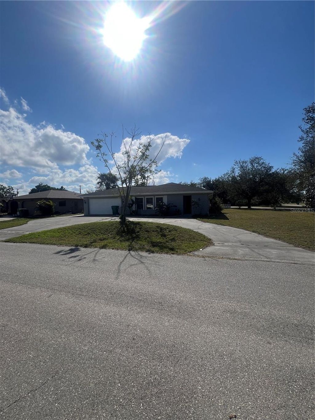 Photo of 22065 Malone Avenue, Port Charlotte, FL 33952 (MLS # TB8491635)