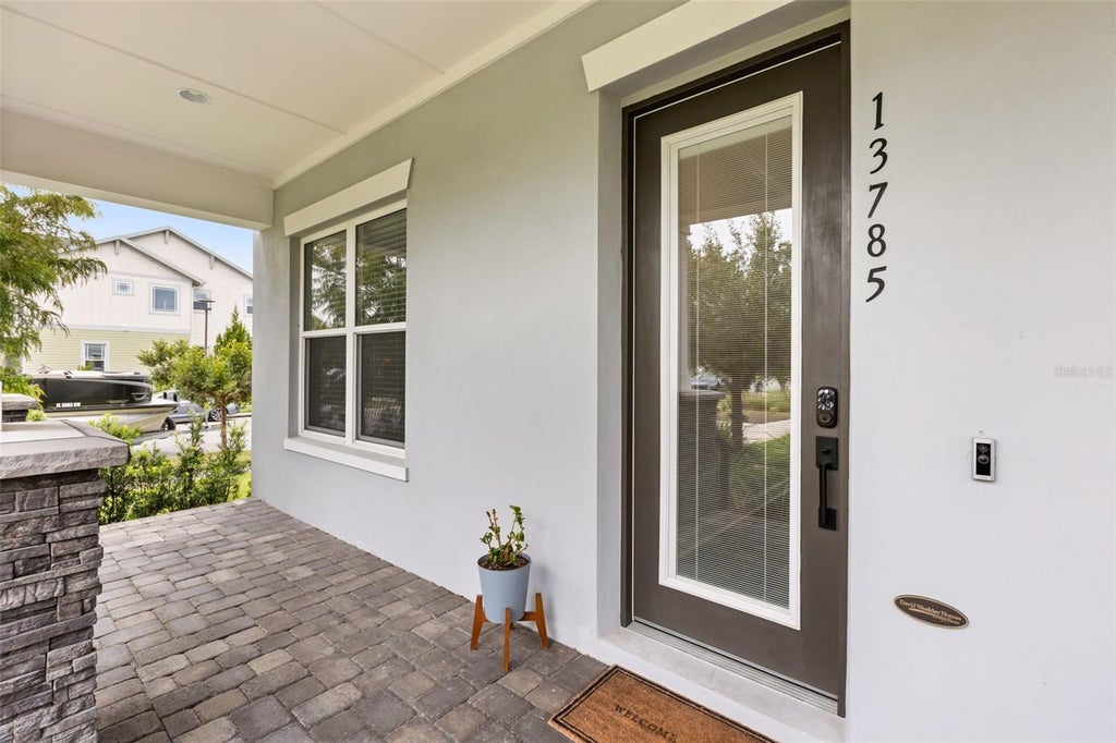 Photo of 13785 Behring Avenue, Orlando, FL 32827 (MLS # O6431749)