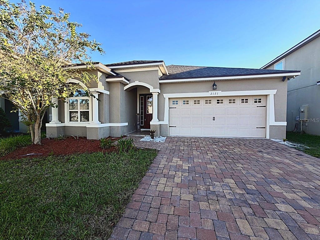 Photo of 2121 Avian Loop, Kissimmee, FL 34741 (MLS # O6445376)