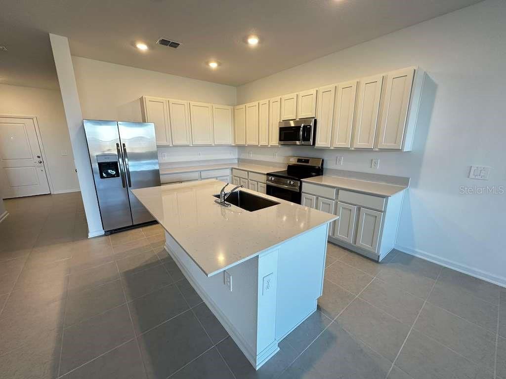 Photo of 2427 Bevel Lane, Davenport, FL 33837 (MLS # O6369753)