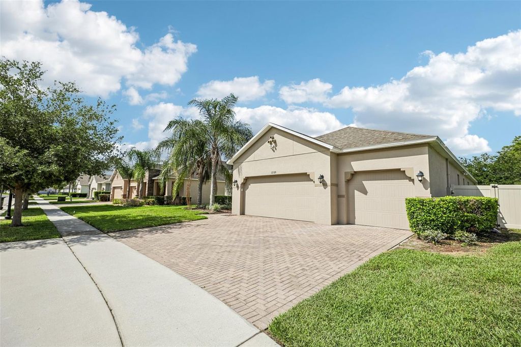 Photo of 12126 Homestead Park Lane, Orlando, FL 32824 (MLS # O6410424)