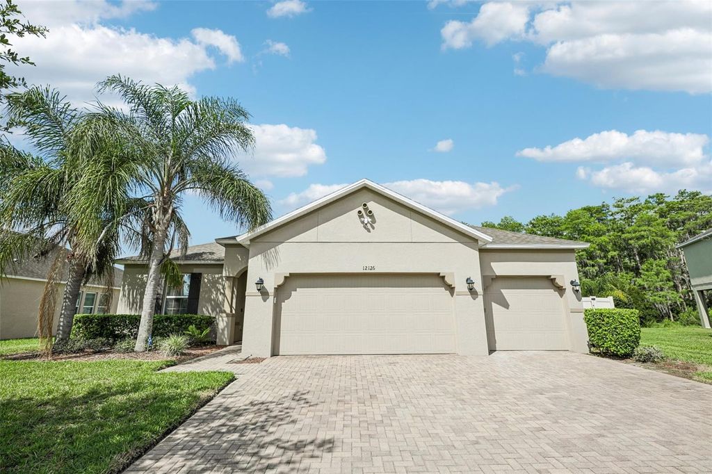 Photo of 12126 Homestead Park Lane, Orlando, FL 32824 (MLS # O6410424)