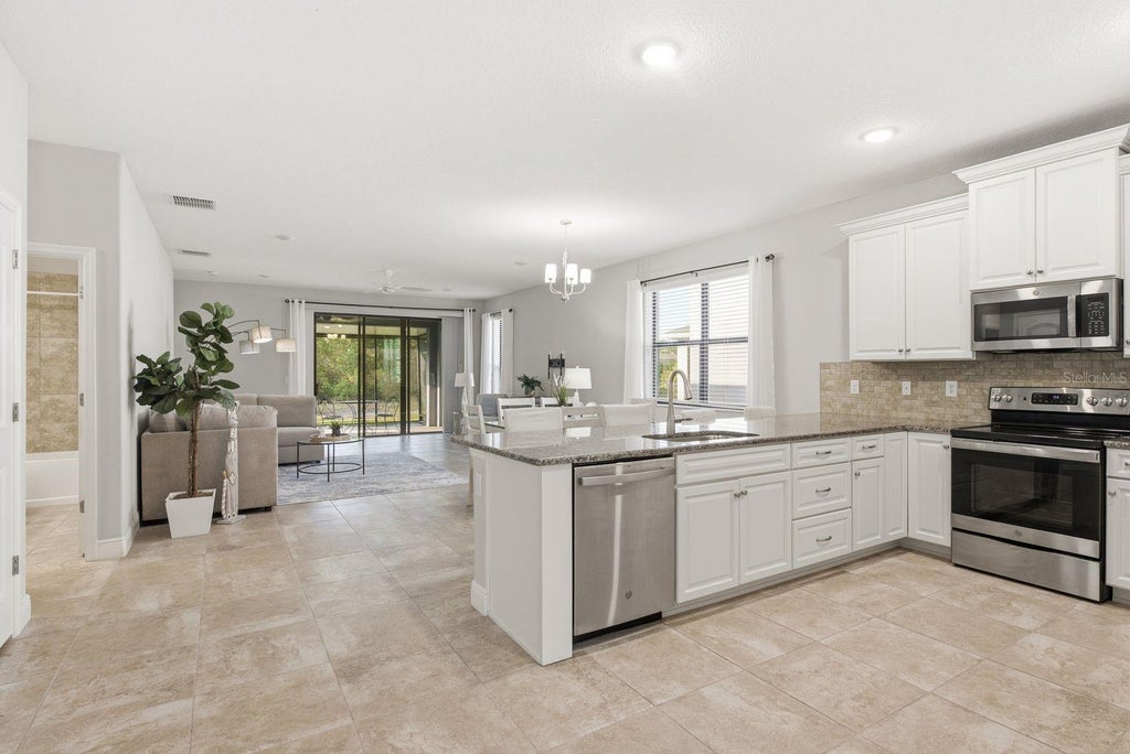 Photo of 11392 Weaver Hollow Road, New Port Richey, FL 34654 (MLS # TB8524692)