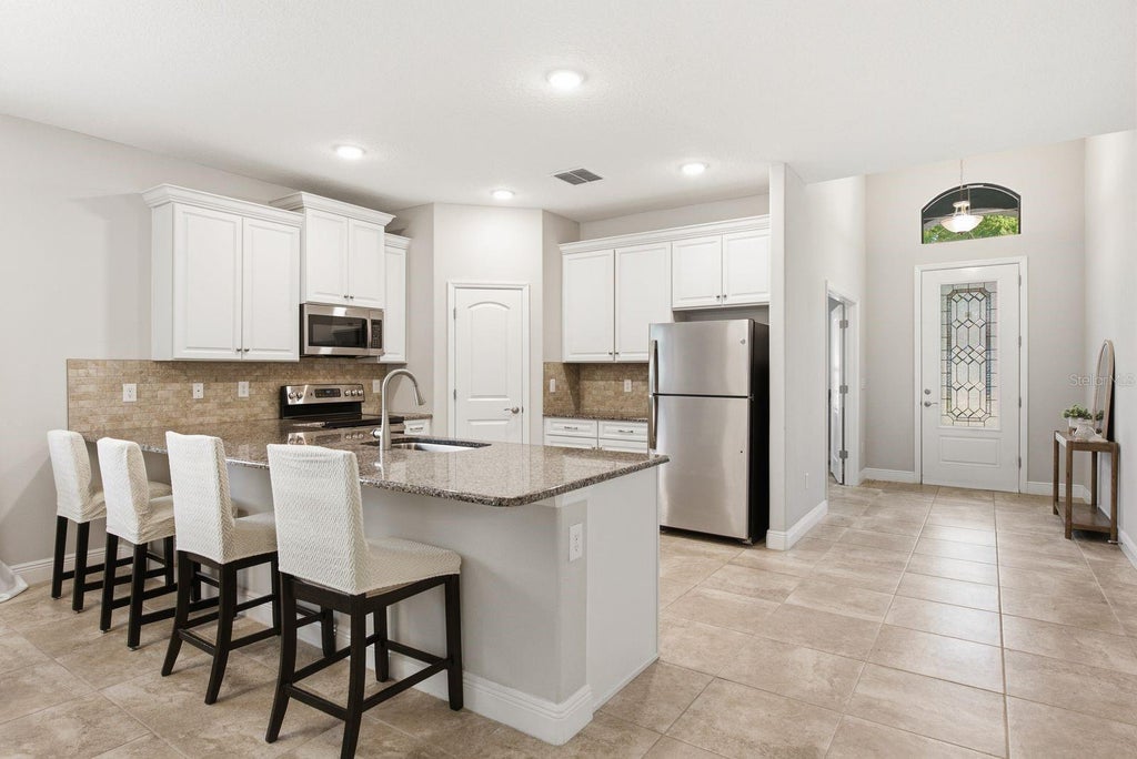 Photo of 11392 Weaver Hollow Road, New Port Richey, FL 34654 (MLS # TB8524692)