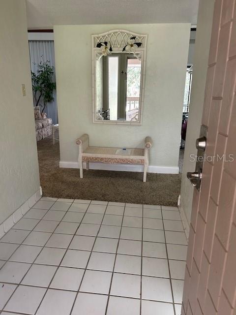 Fully furnished condo with In-Law Suite - This is a 2 bedroom 2 bath located on the 2nd floor. Step into this beautifully furnished 1-bedroom
condo featuring soaring wood-paneled ceilings and sliding glass doors that brings the natural light inside. There is a spacious screened-in balcony for relaxing evenings outdoors. The separate in-law suite comes complete with a kitchenette, private entrance and extra storage-- ideal for guest, extended family or generating rental income. Perfectly situated near Legoland, Orlando attactions, shopping and dining. This property offers the best of both worlds, a comfortable home and a smar investment with excellent income potential.