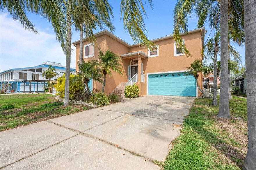 Experience true coastal living in this exceptional waterfront home, perfectly positioned on 60 feet of deep, saltwater canal frontage with direct Gulf access. This beautifully updated residence features its own covered dock and covered electric boat lift (up to 10,000lbs), offering effortless days on the water—plus a community boat ramp just one block away for added convenience.

Inside, the main living level showcases fresh neutral paint and newer vinyl plank flooring, creating a seamless, modern flow throughout the space. With 1630 square feet upstairs and nearly 1200 square feet of climate-controlled living space on the lower level, this home provides over 2800 square feet designed for comfort, entertaining, and coastal relaxation.

A private elevator connects all levels of the home, making daily living and transporting items between floors incredibly easy—an invaluable feature for long-term convenience and accessibility.

The upper level features:

High ceilings and abundant natural light

A modern kitchen with solid wood cabinetry, corian countertops, and an updated tile backsplash

A split floor plan with generously sized guest bedrooms

A spacious primary suite with a large walk-in closet and a beautifully updated ensuite featuring a separate shower and soaking tub

A dedicated laundry room

The lower level is a true extension of the home, cooled by two split A/C units and currently arranged as an expansive entertainment area complete with a bar and pool table. A separate craft/game/reading room/office and a convenient half bath make this level incredibly versatile.

Step outside to your private waterfront oasis. The backyard has been completely transformed with:

Beautiful pavers

Lush landscaping and accent lighting

A Luxurious 8.5' x 13.5' swim spa

Retractable awnings for shade and comfort

Spend your evenings on the dock, watching the sun melt into the Gulf horizon—an experience that never gets old. The boat lift includes a remote control, allowing you to prep the lift before you even return from your Gulf adventures.

This golf-cart-friendly community offers a private boat ramp, and you’re just moments from SunWest Park and local waterfront restaurants.

A rare combination of waterfront luxury, thoughtful updates, and effortless Gulf access—this home delivers the Florida lifestyle at its finest.