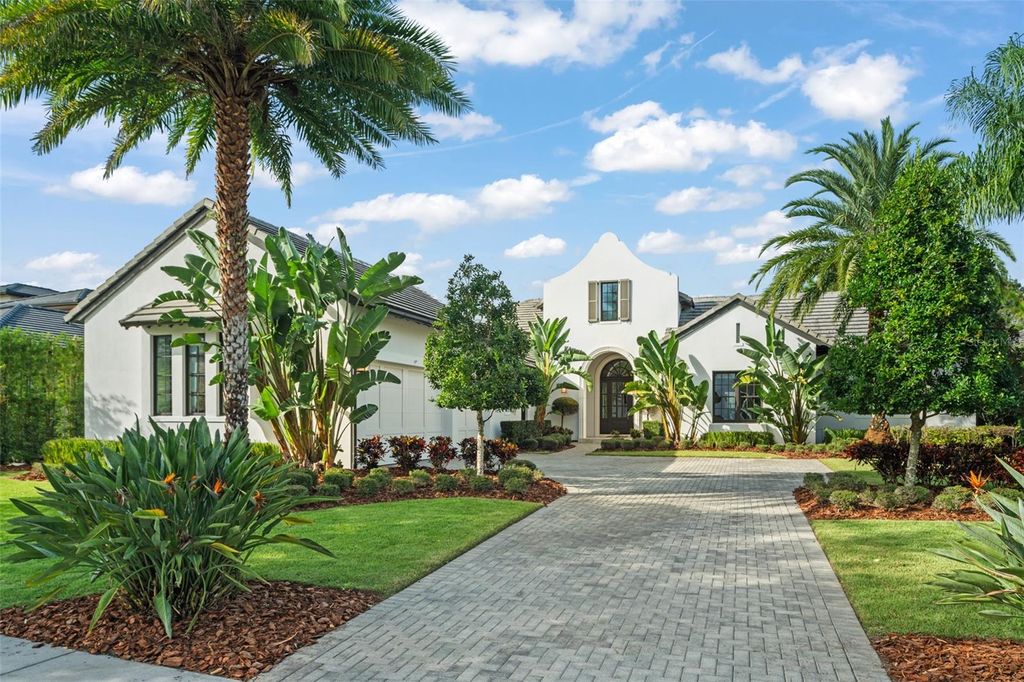 Photo of 8557 Lake Nona Shore Drive, Orlando, FL 32827 (MLS # O6349890)