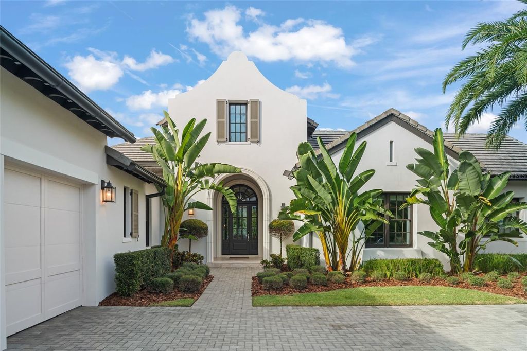 Photo of 8557 Lake Nona Shore Drive, Orlando, FL 32827 (MLS # O6349890)