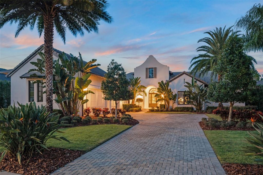 Photo of 8557 Lake Nona Shore Drive, Orlando, FL 32827 (MLS # O6349890)