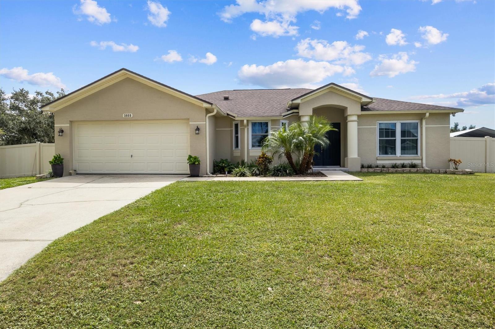 Welcome to this beautifully upgraded 3-bedroom, 2-bathroom pool home nestled in the desirable South Lakeland area—perfectly located between Orlando and Tampa. This home features a spacious kitchen that opens to a large living room with a custom-built fireplace and built-in bookshelves, creating a cozy and inviting atmosphere. The separate dining area offers flexibility as a potential 4th bedroom or a home office. Enjoy the privacy of a split floor plan with a generous primary suite featuring double closets, dual vanities, a soaking tub, and a tiled walk-in shower. Step outside to your own backyard oasis with a covered patio, screen-enclosed pool with a tranquil waterfall, vinyl fencing for added privacy, and two storage sheds. This home offers numerous upgrades and is perfect for entertaining or relaxing in your private retreat. Don't miss your chance to own this South Lakeland gem! *** Features and upgrades*** Roof(2020), A/C unit(2018), A/C duct work replacement(2023), Windows replaced(2020), Exterior paint(2019), Pool deck repaint(2025), LPV flooring and carpet(2019), Pool Rescreening(2024), Garage door opener(2019), Dryer vent cleaning(2024), solar water heater system(2012), sheds(2013, 2015), Septic pumped(2025), fireplace and built-in shelving, interior paint, inside laundry room cabinets(since 2019), A/C unit and pool are frequently maintained. Tesla level 2 charger, Viper Pool equipment, two sheds, curtain rods and shades, ring camera convey with purchase.