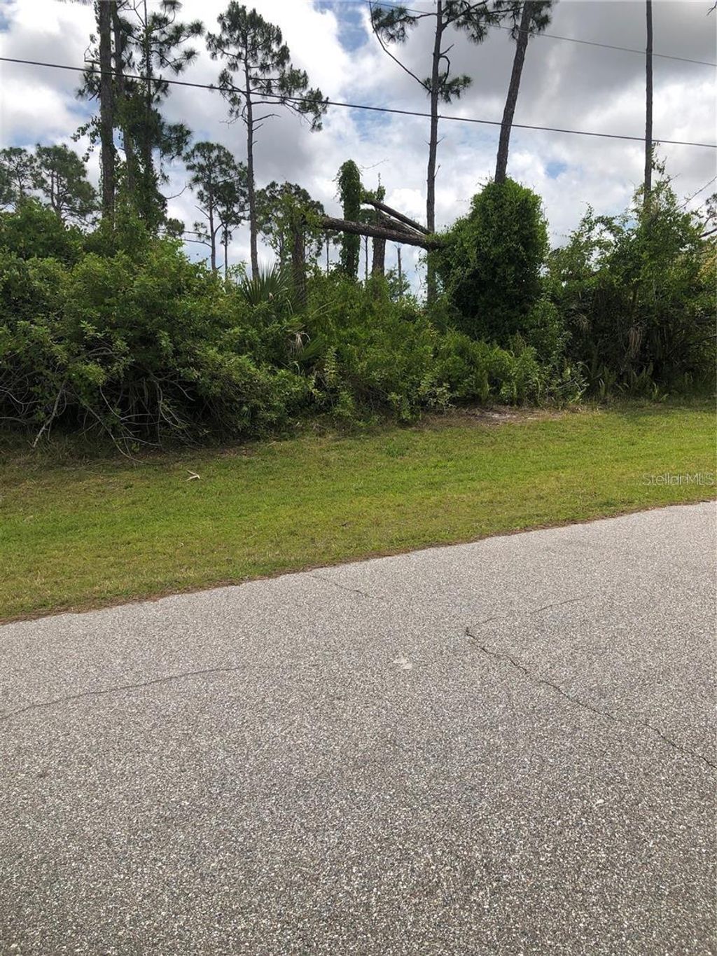 Photo of 201 Jade Street, Rotonda West, FL 33947 (MLS # A4619643)