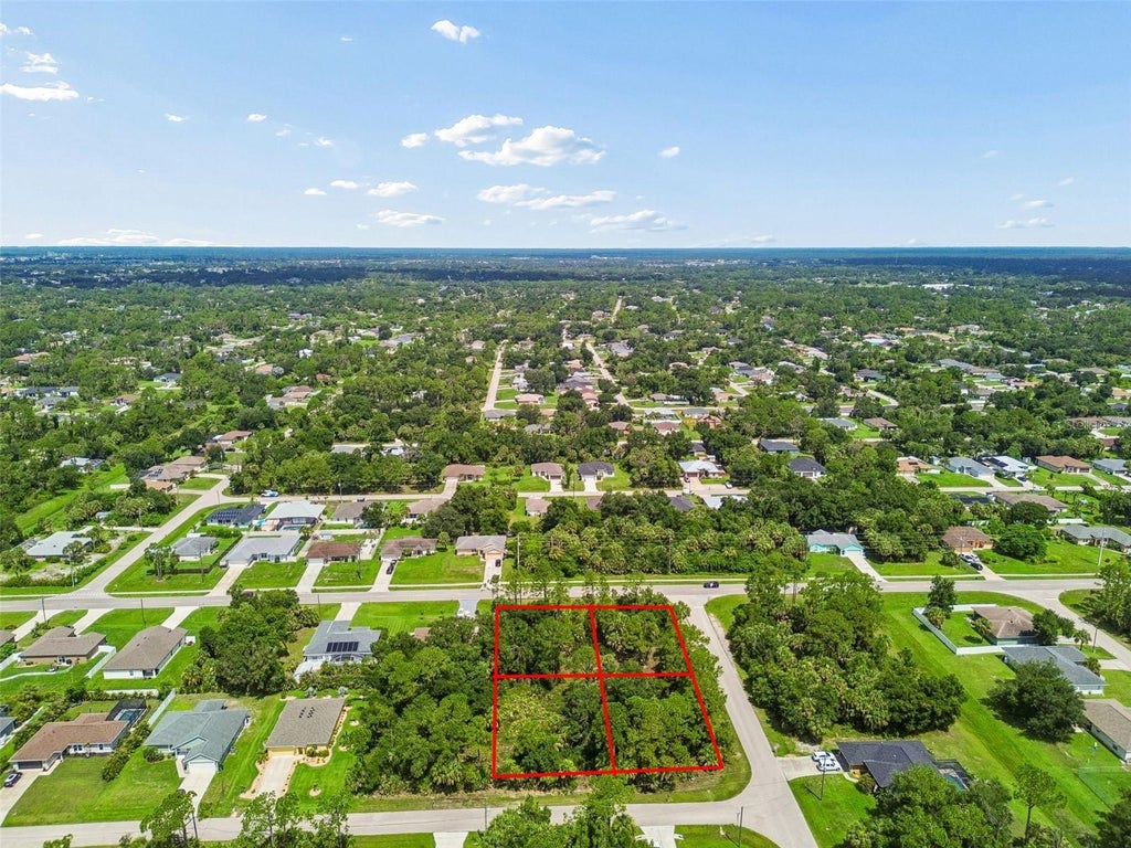 Photo of 13 S Chamberlain Boulevard, North Port, FL 34286 (MLS # TB8533461)