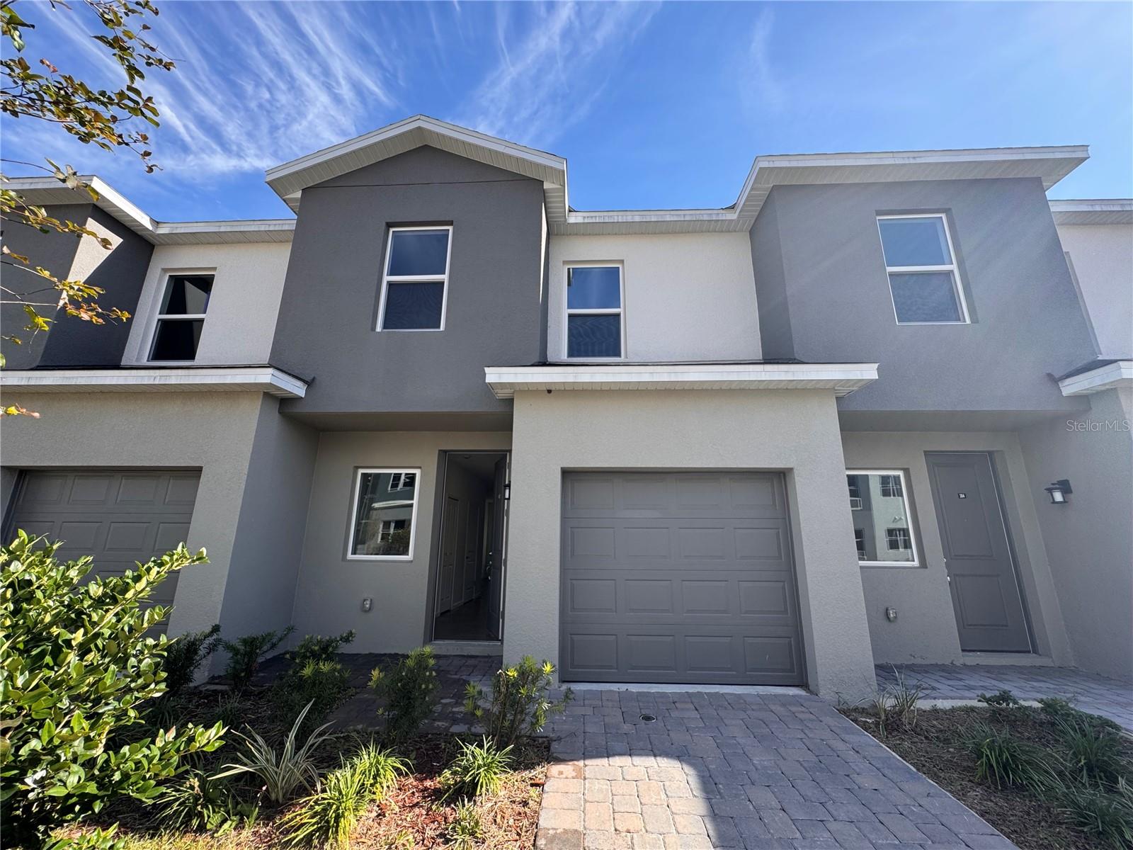 SANDLAKE STATION TOWNHOMES CONDOMINIUM - Residential