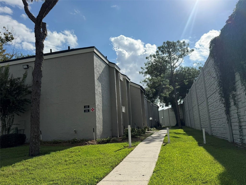 Photo of 136 Springwood Circle #A, Longwood, FL 32750 (MLS # O6444926)