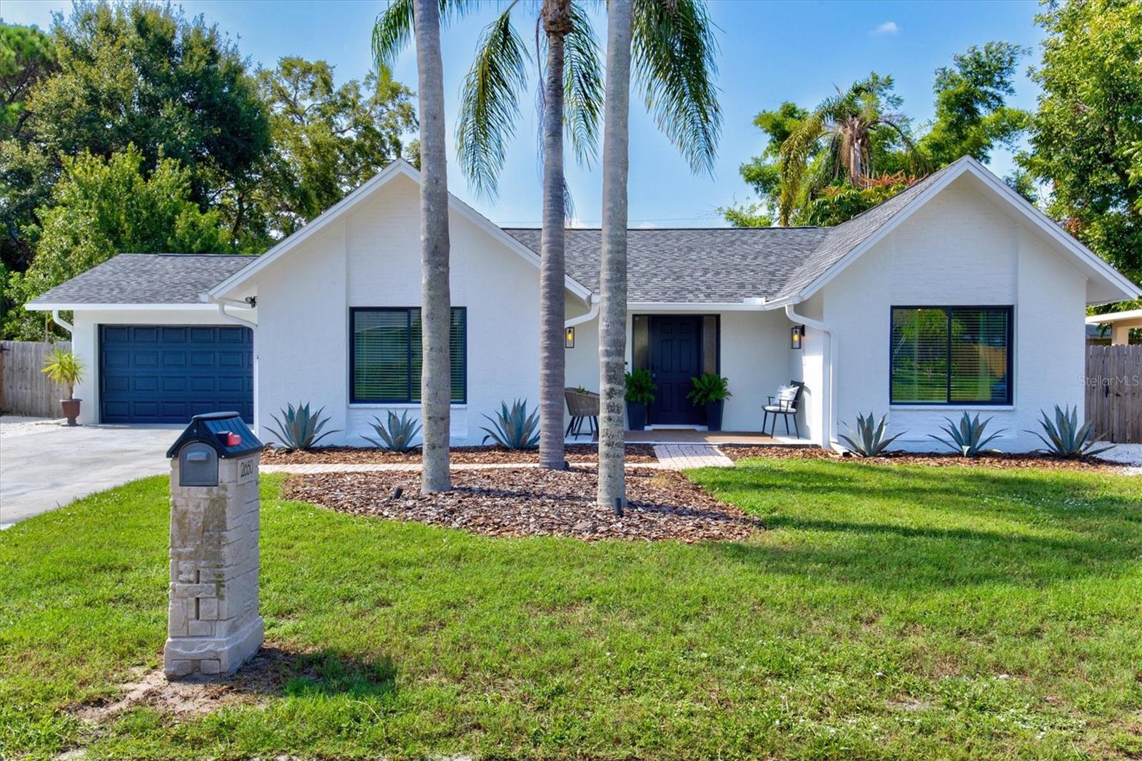 Welcome to Casa Pura Vida! This bohemian styled designer pool home is the perfect vacation rental for groups of up to 8 to relax and enjoy the "pure life". The house features 3 bedrooms, 2 bathrooms, central living & dining rooms w/ views of the sparkling blue heated pool & covered outdoor kitchen area, a private fenced backyard w/ tropical landscaping, a chefs kitchen w/ breakfast bar & separate eat-in area/game room. All of this just a few miles from Payne Park, downtown, and area beaches!