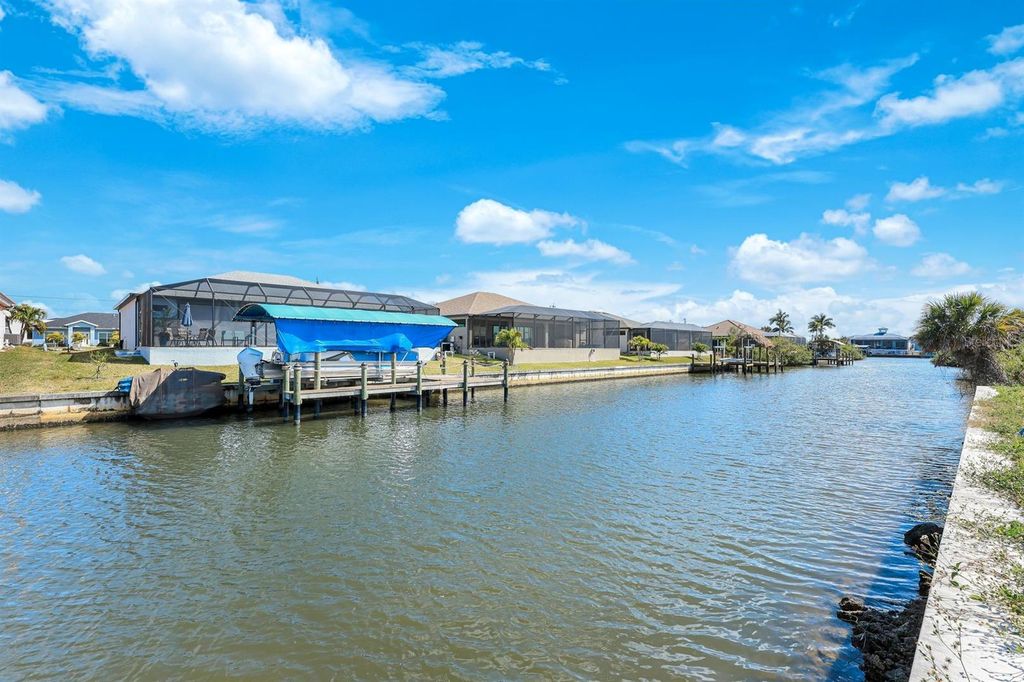 Photo of 1925 NW 34th Place, Cape Coral, FL 33993 (MLS # TB8482702)